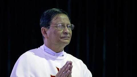 Newly appointed Cardinal Charles Maung Bo prays during a religious service at St. Paul’s Missionary school in suburbs of Yangon, Myanmar, Jan. 5, 2015.