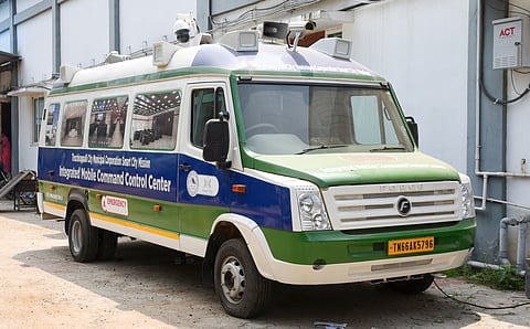 A Mobile Command and Control vehicle parked on the premises of the corporation office.