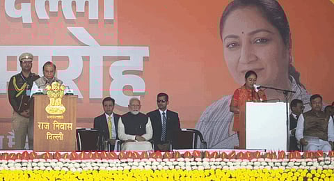 CM-designate Rekha Gupta and six other BJP MLAs take oath at the swearing-in ceremony of the Delhi Government at the Ramlila Maidan in New Delhi on Thursday, Feb. 20, 2025.