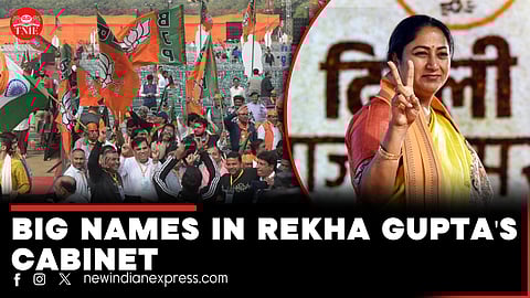 Prime Minister Narendra Modi exchanges greetings with newly sworn-in Delhi Chief Minister Rekha Gupta during the swearing-in ceremony of the Delhi govrnment, in New Delhi, Thursday, Feb. 20, 2025.