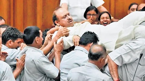 Former Leader of Opposition Vijender Gupta being evicted from Assembly | File