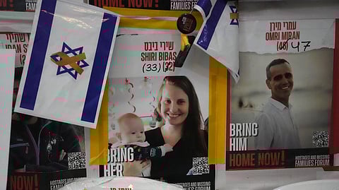 A poster shows Shiri Bibas, who was kidnapped to Gaza with her husband and two young sons on Oct. 7, 2023, in Jerusalem, Friday, Feb. 21, 2025. 