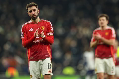 Manchester United captain Bruno Fernandes applauding the crowd (Photo | AP)