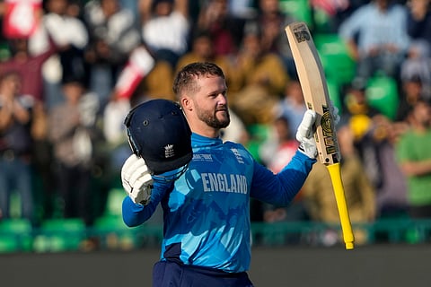 Ben Duckett celebrates after scoring a century during the Champions Trophy match between Australia and England in Lahore (Photo | AP)