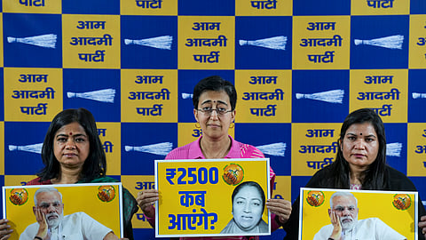 Former Delhi chief minister and Aam Aadmi Party (AAP) leader Atishi during a press conference, in New Delhi, Friday, Feb. 21, 2025. Atishi has criticised the newly formed BJP government in Delhi for not fulfilling its pre-poll promise of passing the scheme of Rs 2,500 monthly allowance to women at the first cabinet meeting. 