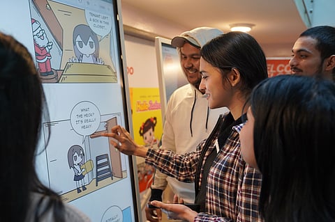 Enjoying the K-Webtoon experience zone at KCCI