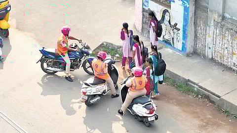 The police department urges the public to immediately report any suspicious individuals near educational institutions 