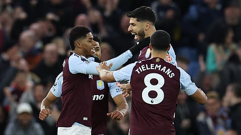 Aston Villa's Marco Asensio (R) celebrates with teammates after scoring their first goal during the EPL football match between Aston Villa and Chelsea at Villa Park in Birmingham, central England on February 22, 2025.