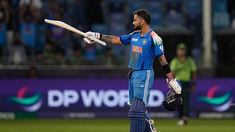 Virat Kohli celebrates after beating Pakistan during the ICC Champions Trophy cricket match between India and Pakistan at Dubai International Cricket Stadium.
