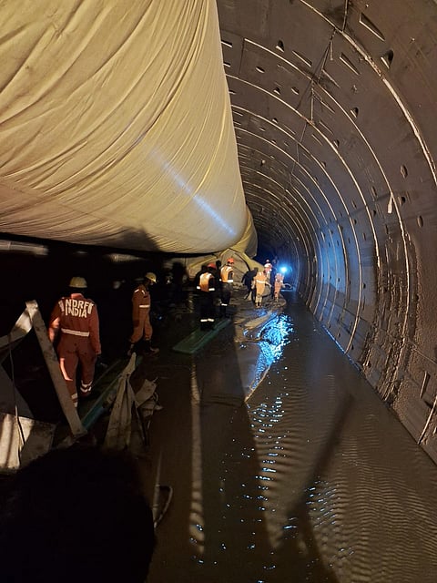 Army personnel near the Srisailam Left Bank Canal (SLBC) project site where a portion of the tunnel collpased, in Nagarkurnool district.