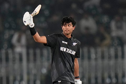 New Zealand's Rachin Ravindra celebrates after scoring a century during the ICC Champions Trophy match against Bangladesh in Rawalpindi (Photo | AP)