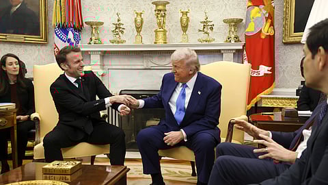 France's President Emmanuel Macron, from second left, speaks with US President Donald Trump during a meeting in the Oval Office of the White House in Washington, Monday, Feb. 24, 2025.