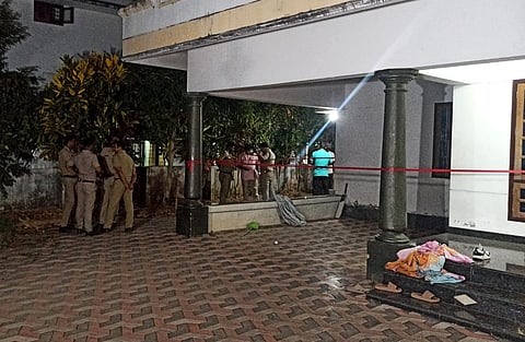 Police personnel standing in front of the house of Afan, accused in the case of killing 5 people near Venjaramoodu in Thiruvananthapuram on Monday