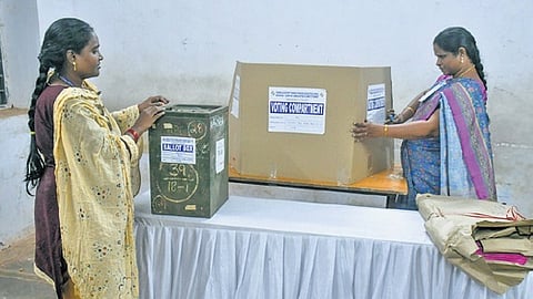 A polling booth is being set up at AKTP School in Vijayawada