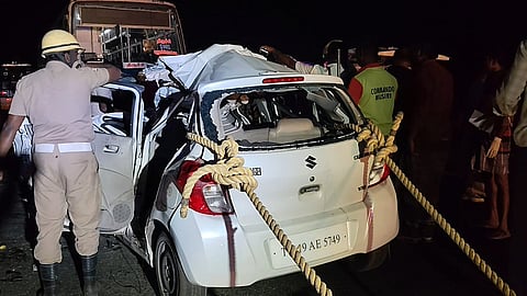 Firefighters struggled for more than an hour to retrieve the bodies trapped in the wreckage, police said.