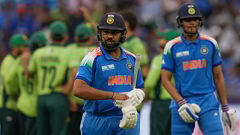 India's captain Rohit Sharma leaves the field after losing his wicket during the ICC Champions Trophy cricket match between India and Pakistan at Dubai International Cricket Stadium, United Arab Emirates, Sunday, Feb. 23, 2025.