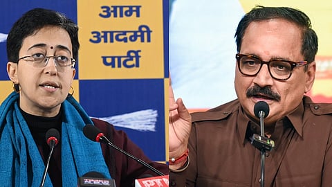 Atishi (L), Delhi BJP president Virendra Sachdeva 