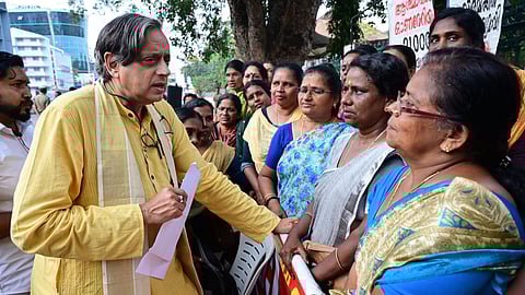 Shashi Tharoor MP interacting with Kerala Asha Health Workers Associations indefinite protest in front of the Secretariat on Wednesday.