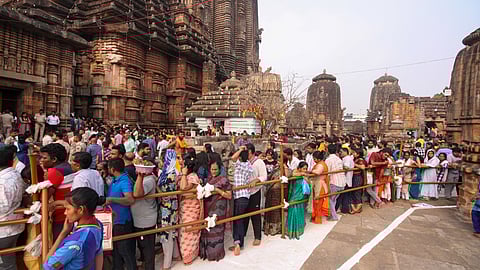 Devotees standing in queue to offer puja at Lingaraj temple on the occasion of Maha Shivratri in Bhubaneswar on Tuesday