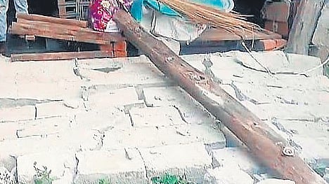 The collapsed wall of a house in Eturunagaram due to an earthquake 