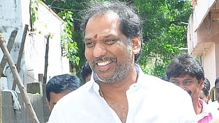 Minister Gottipati Ravi Kumar. Express