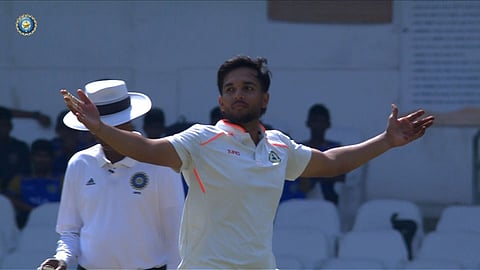Harsh Dubey reacts after picking up the wicket of Salman Nizar on the stroke of Lunch.
