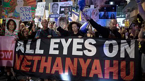 In this photo from Oct. 22, 2024, supporters of Israelis held hostage by Hamas in the Gaza Strip protest against prime minister Benjamin Netanyahu in Tel Aviv.
