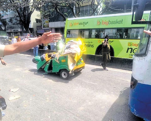 In a freak accident, auto crushed between BMTC buses