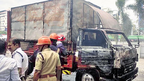 Fire and Rescue Services personnel after extinguishing the fire that broke out during a film shooting near Saritha Theatre on Saturday