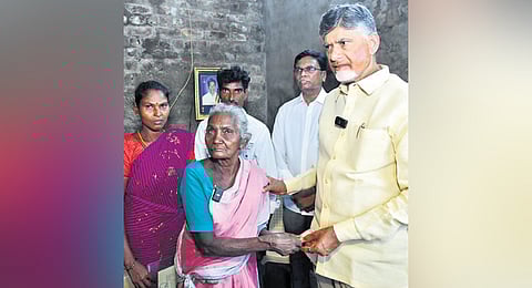 CM Chandrababu Naidu hands over pension to a woman at Ramanaidupalli in Chittoor district on Saturday 