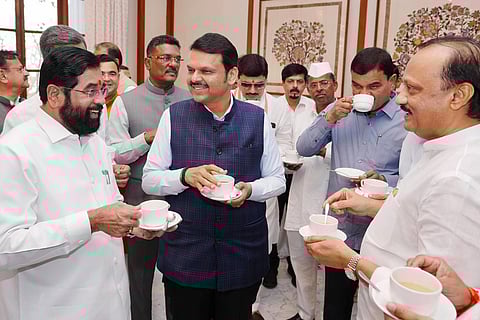 Maharashtra Chief Minister Devendra Fadnavis with Deputy Chief Ministers Eknath Shinde and Ajit Pawar during a tea party organized at the Sahyadri State Guest House ahead of the Budget Session of the State Legislative Assembly, in Mumbai on Sunday.