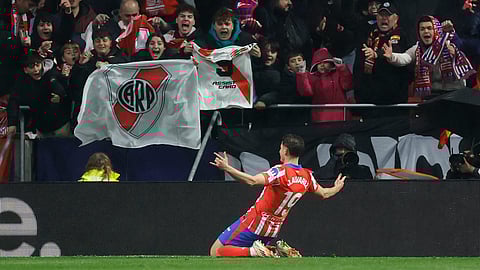 Atletico Madrid's Julian Alvarez celebrates scoring the opening goal during the Spanish league footbal match between Club Atletico de Madrid and Athletic Club Bilbao at Metropolitano Stadium in Madrid on March 1, 2025. 