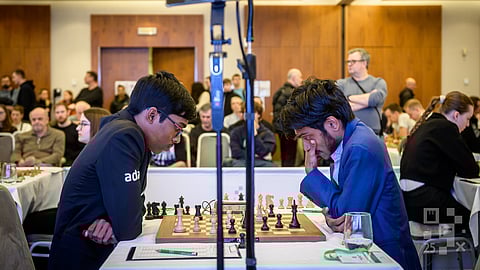 Grandmaster R Praggnanandhaa (L) and fellow Indian Aravindh Chithambaram during their game at the Prague Masters chess tournament