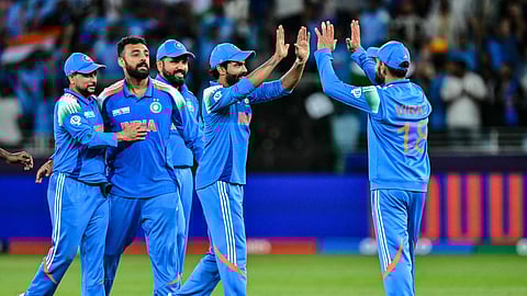 India players celebrate a wicket against New Zealand on Sunday