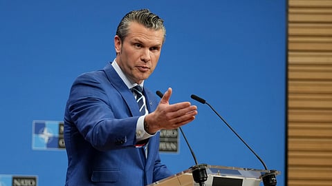US Defense Secretary Pete Hegseth speaks during a media conference at NATO headquarters in Brussels, Feb. 13, 2025.