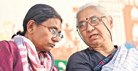 AICC Telangana in-charge Meenakshi Natarajan with social activist Medha Patkar during the NAPM’s 30th anniversary national convention 