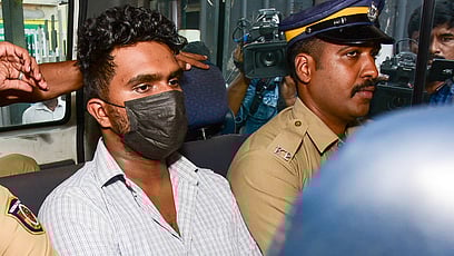  Afan, the accused in the Venjaramoodu mass murder case, being escorted to Poojappura Central jail. 