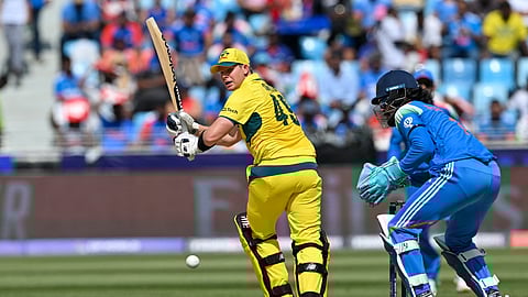Australia's captain Steve Smith plays a shot during the ICC Champions Trophy one-day international (ODI) semi-final cricket match between Australia and India at the Dubai International Stadium in Dubai on March 4, 2025. 