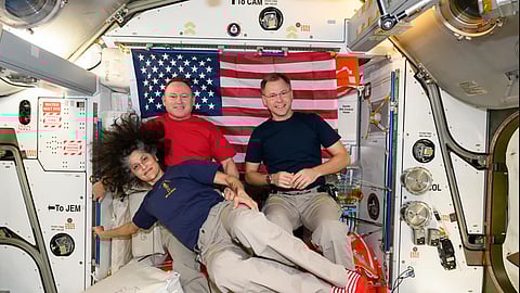 This image provided by NASA shows Nick Hague, right, Suni Williams, and Butch Wilmore.