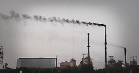 A factory emitting black smoke in Koppal, Karnataka