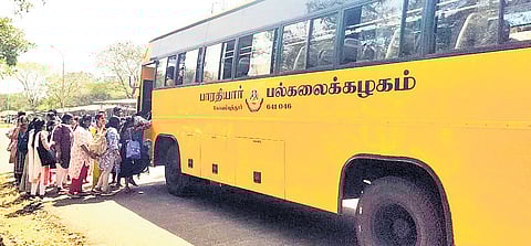 Students of Bharathiar University leaving the campus in a bus following the alleged sighting of a leopard on the premises on Wednesday. An officer from the forest department said leopard pugmarks (inset) were found at the spot.
