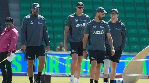 New Zealand players take a look at the pitch ahead of the ICC Champions Trophy semifinal cricket match between New Zealand and South Africa.