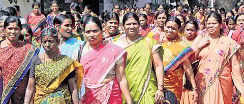Anganwadi workers from all the State Districts are seen in protest for various demands held rally from City Railway Station to Freedom Park in Bengaluru on Friday.