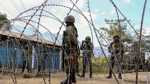 Security officials patrol the Kangpokpi district in Manipur.
