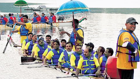Teams participating in a previous edition of the ‘Brampton Boat Race’ in Canada (R) Kurian Prakkanam with Minister of Infrastructure for the Province of Ontario Kinga Surma during the event