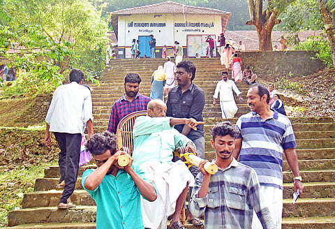 Dollies (palanquin-type carriages) used to carry aged and specially-abled voters to reach the polling booth at Sree Narayana Satha Valsara Memorial LP School at Mundukottackal.