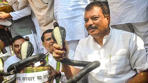 LoP in the Madhya Pradesh Assembly and Congress leader Umang Singhar during a demonstration against the BJP-led state government, in Bhopal.