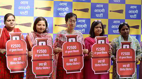 LoP in the Delhi Assembly and AAP leader Atishi during a press conference regarding the BJP-led Delhi government's promise to roll out Rs 2,500 monthly financial assistance to women, in New Delhi.