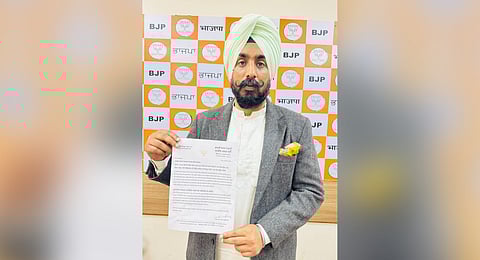 Punjab BJP spokesman Pritpal Singh Baliawal with the letter (Photo | Special arrangement)