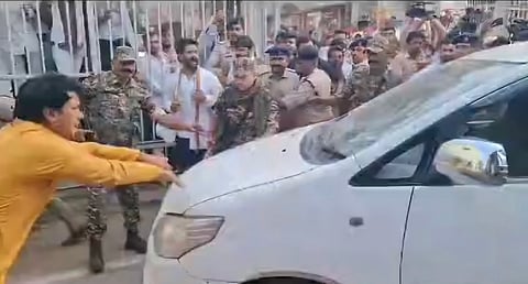 Congress supporters attacked the car carrying ED officials, blocking its path and throwing stones, damaging the vehicle, after raids at Bhupesh Baghel's residence in Bhilai.